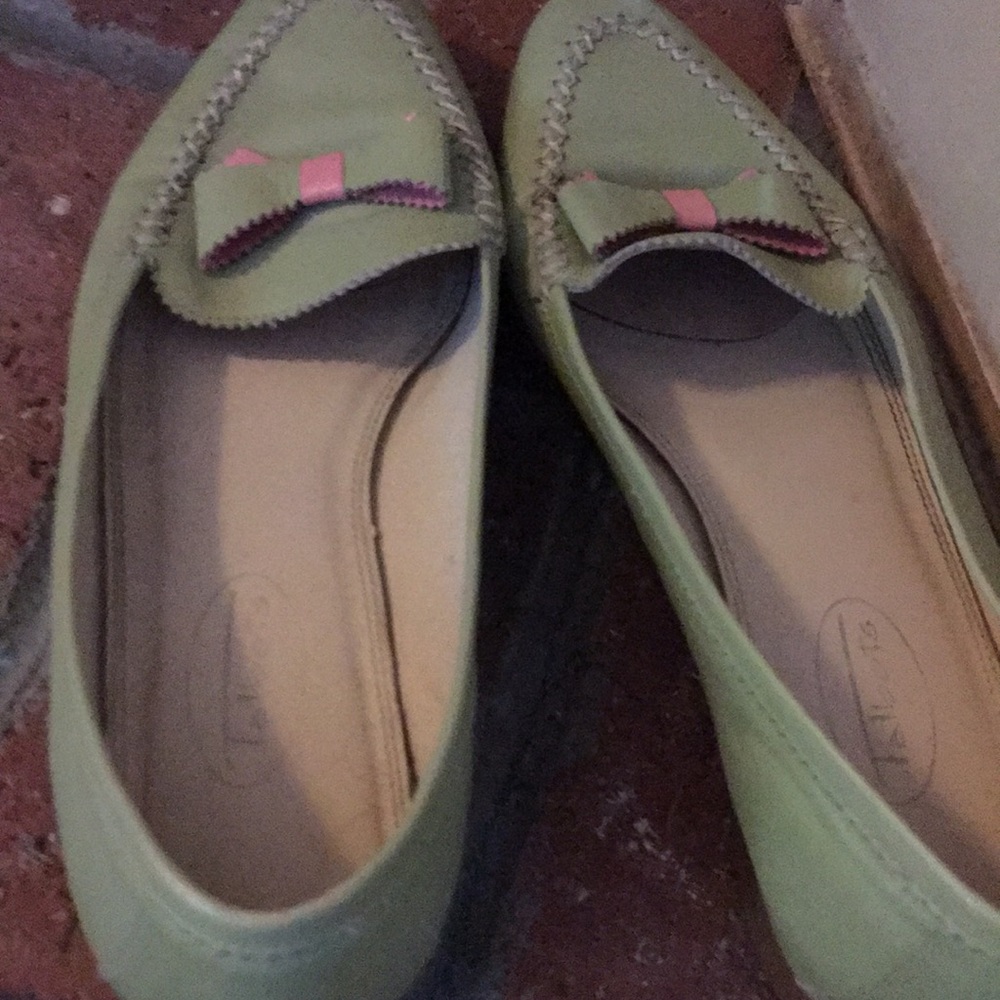 Light green with pink on the bows .Talbots